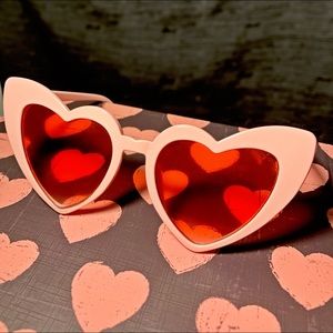 Heart shaped sunglasses with red effect